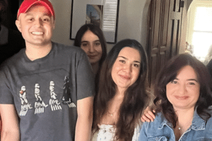 Dylan posing with family