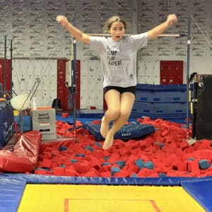 Angie jumping on a trampoline